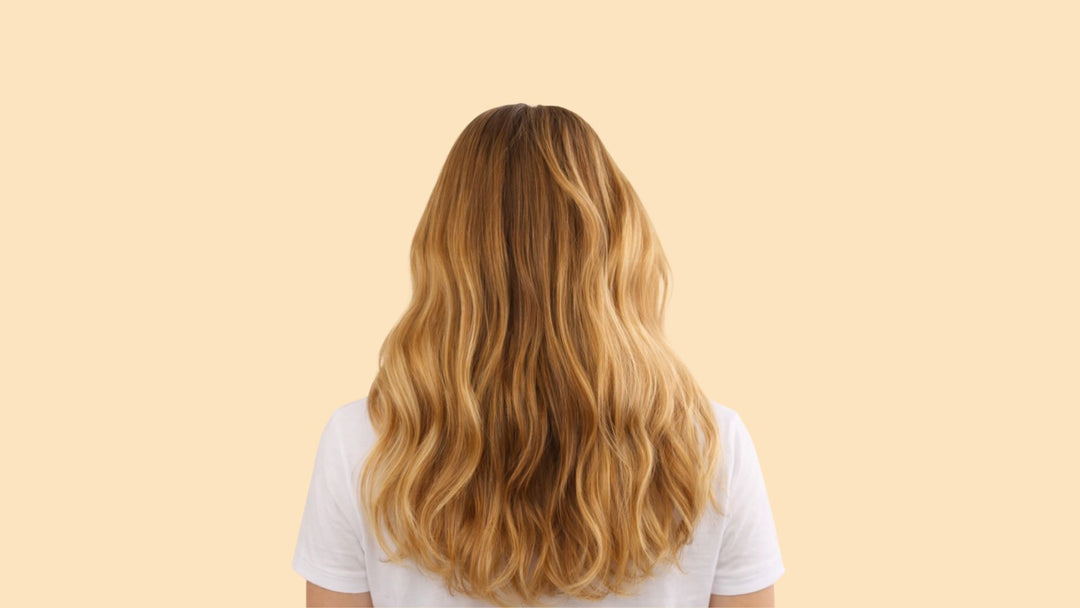 Smooth wavy blonde hair after Glazy capsule treatment